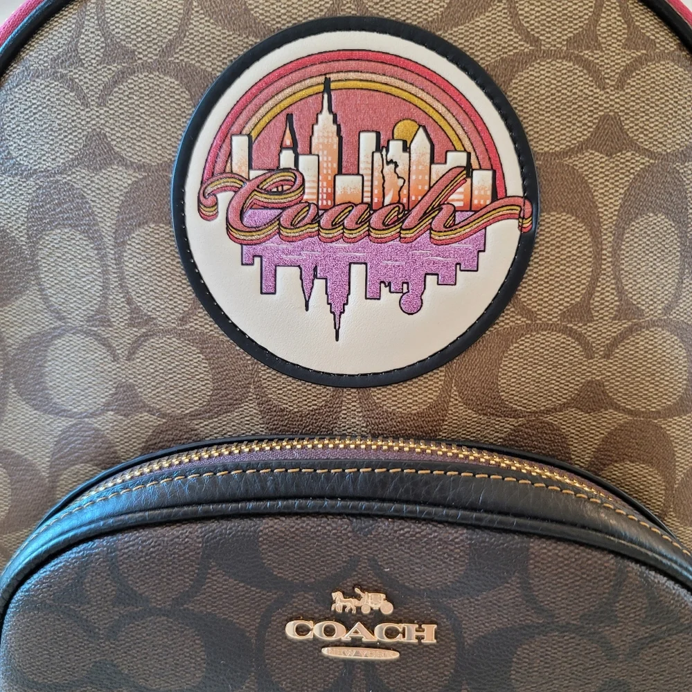 Coach Signature Brown Tan Backpack with Pink Trim and Purple Accent